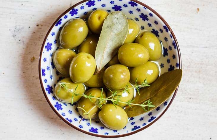 wellhealthorganic.com:11-health-benefits-and-side-effects-of-olives-benefits-of-olives