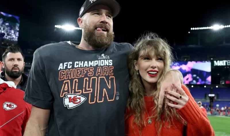 Taylor Swift and Travis Kelce Share a 'Rom-Com' Moment at Eras Tour Show